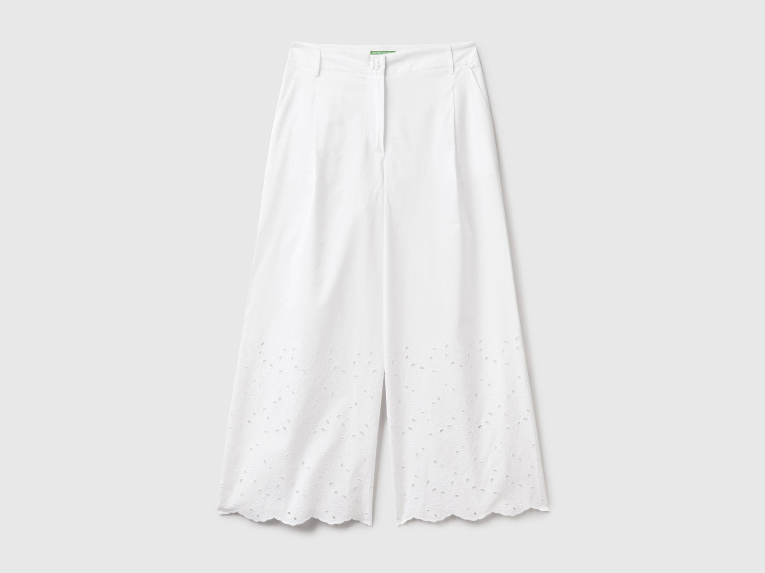 Pantaloni cropped in puro cotone leggero con ricami in sangallo sul fondo da donna bianco | Benetton Outlet