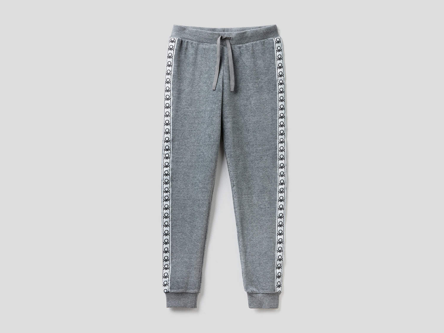 Pantaloni in ciniglia con bande logate da bambina grigio scuro | Benetton Outlet