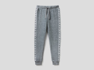 Pantaloni in ciniglia con bande logate