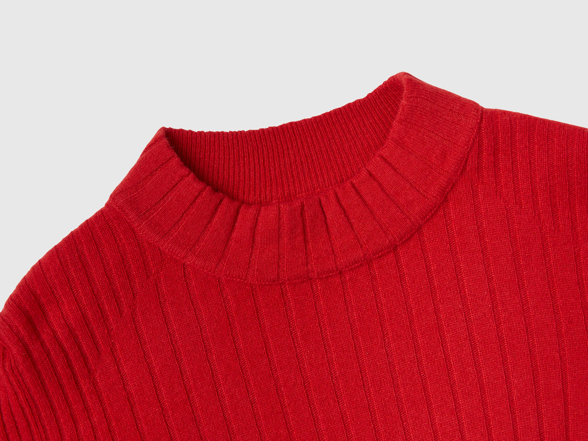 Maglia lupetto con spacchi