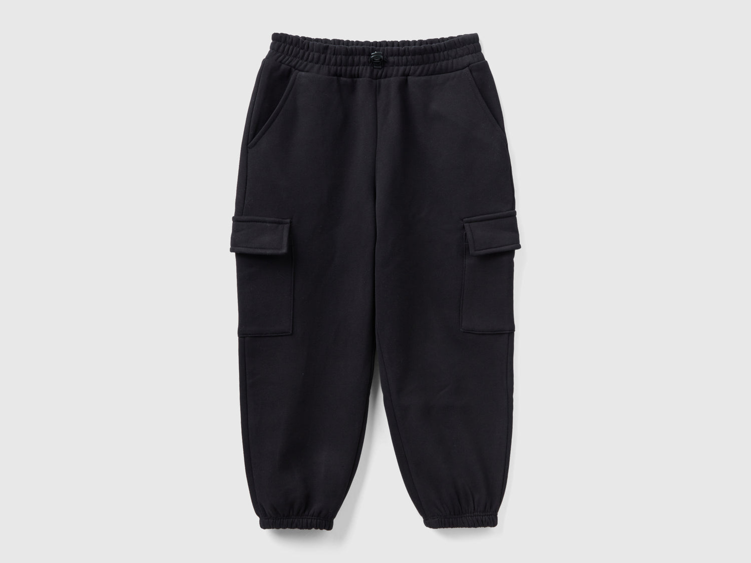 Joggers cargo con coulisse da bambina nero | Benetton Outlet
