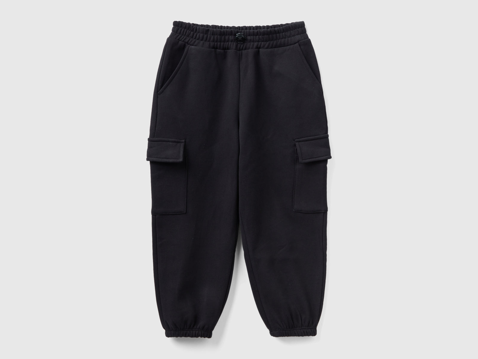 Joggers cargo con coulisse da bambina nero | Benetton Outlet