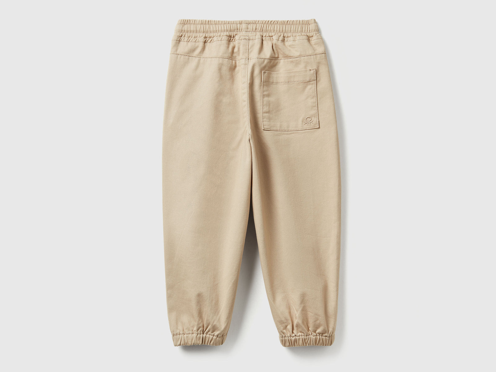 Joggers in cotone stretch con coulisse da bimbo beige 2 | Benetton Outlet