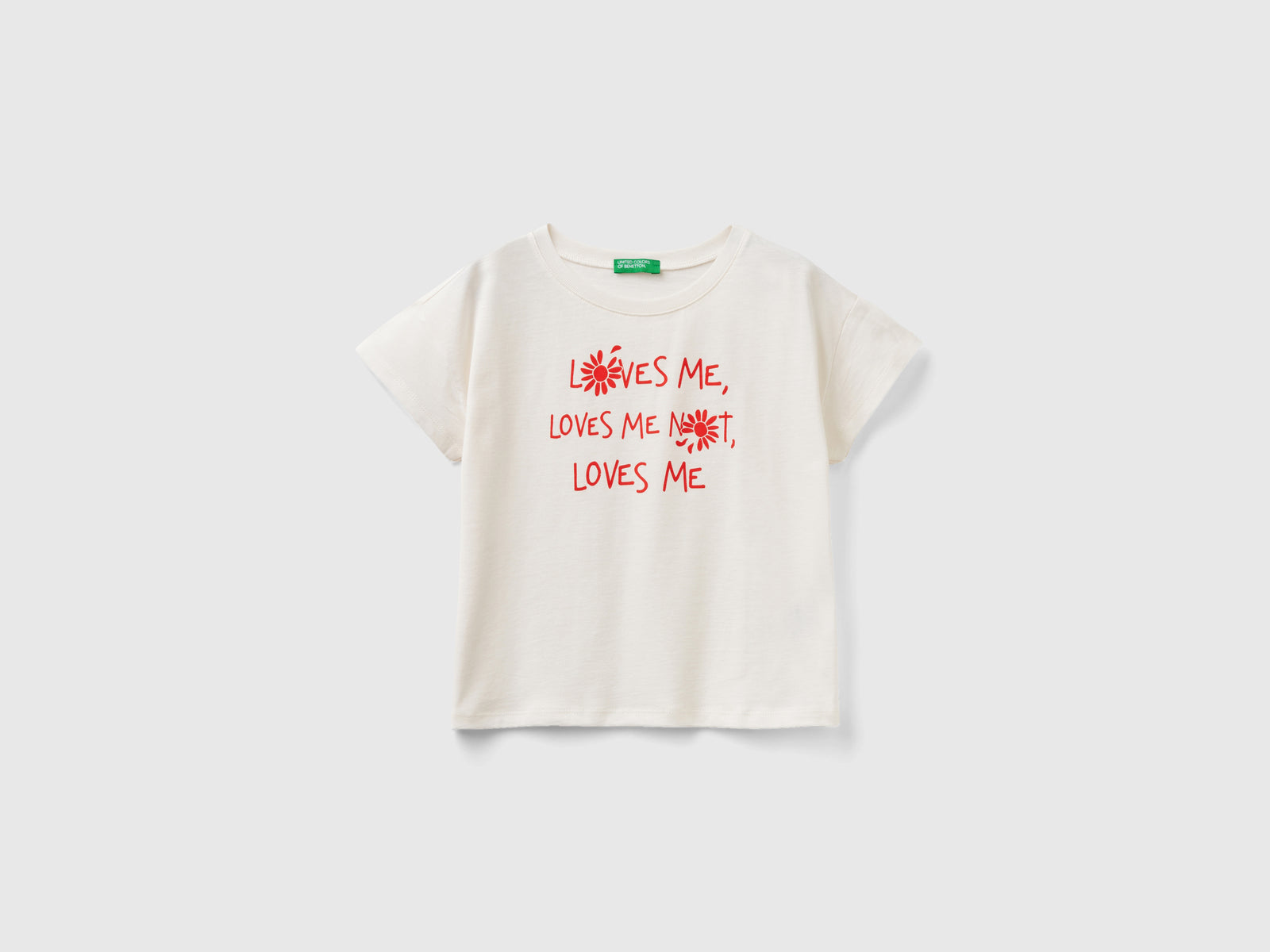 Maglietta boxy fit in cotone bio da bambina bianco panna | Benetton Outlet