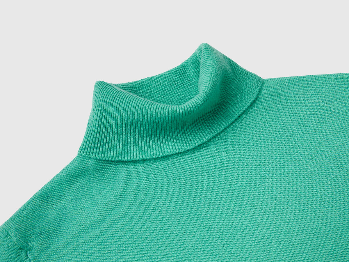 Maglione dolcevita chiaro in pura lana Merino