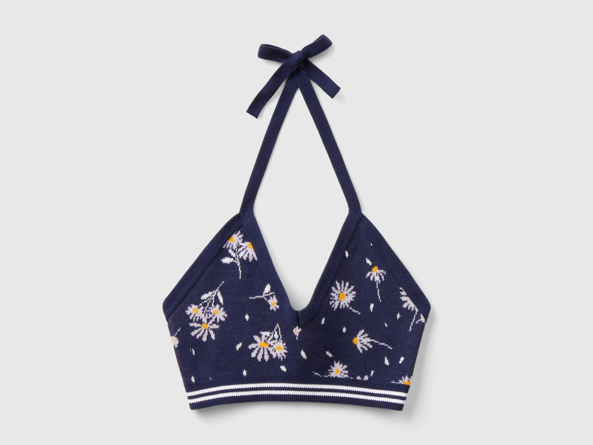 Top cropped in maglia a fiori