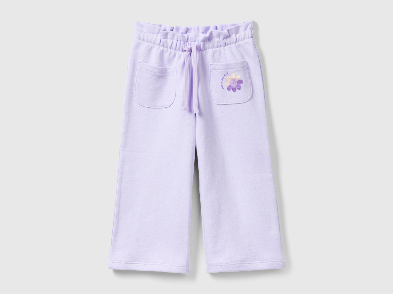 Pantaloni in felpa cropped da bimba lilla | Benetton Outlet