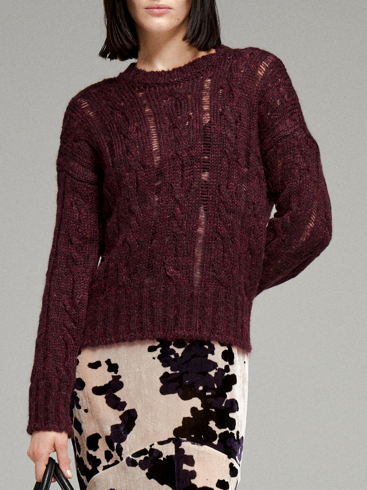 Maglia bordeaux con trecce