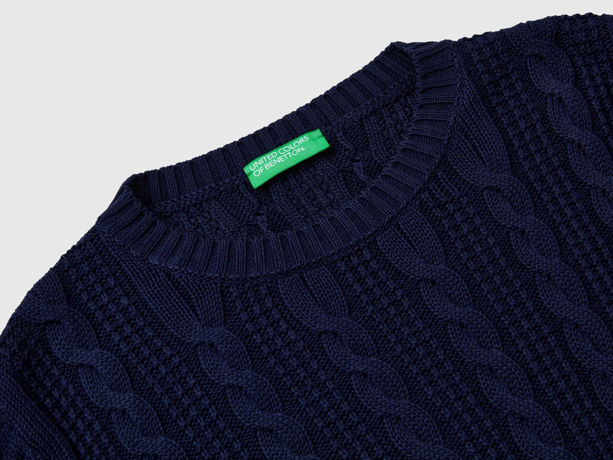 Maglia cropped a trecce
