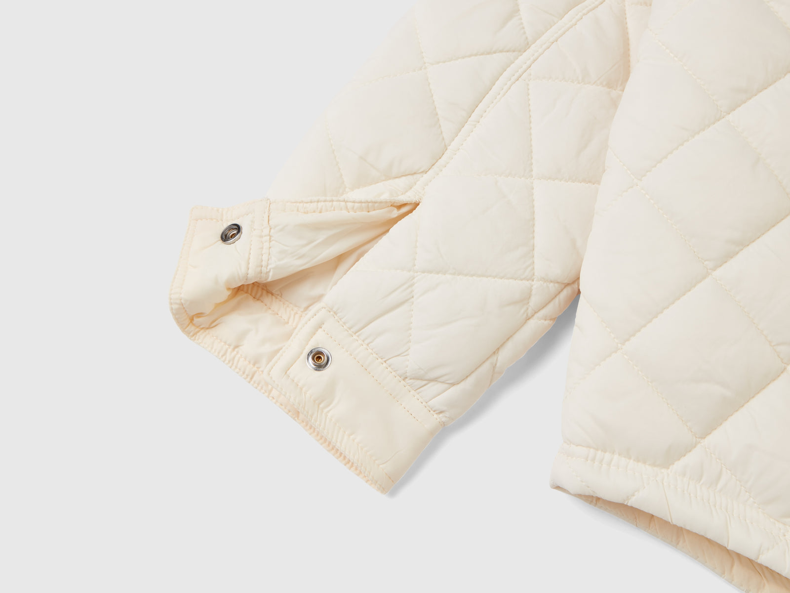 Giubbino leggero trapuntato da bambina bianco panna 4 | Benetton Outlet