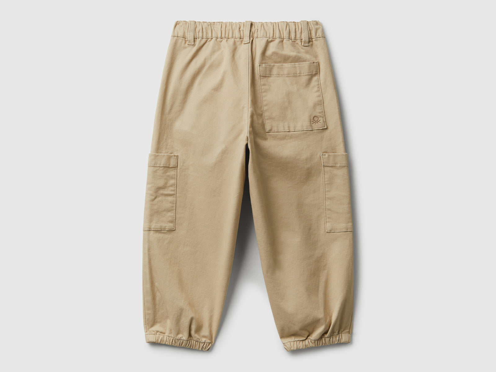 Pantaloni parachute in cotone stretch da bimbo beige 2 | Benetton Outlet