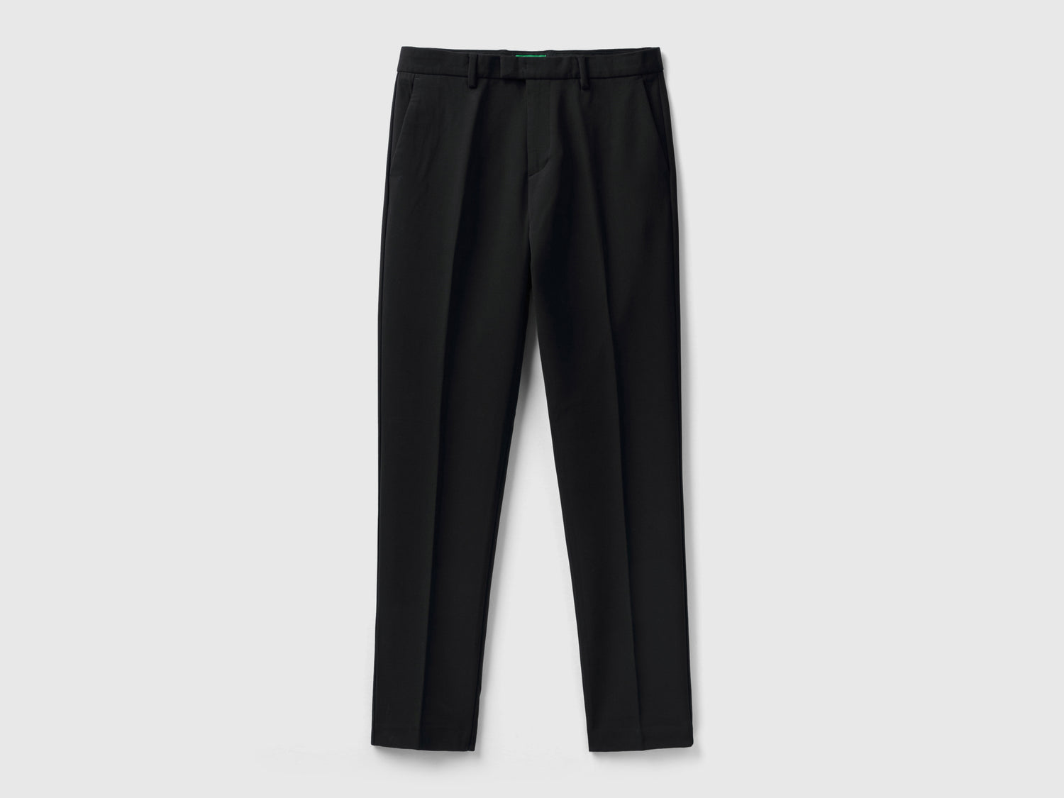 Pantaloni fluidi slim fit da uomo nero | Benetton Outlet