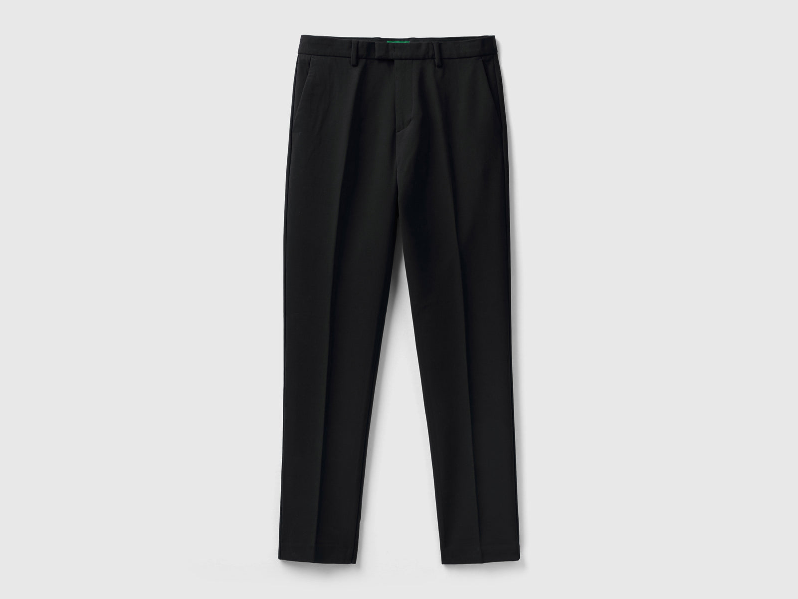 Pantaloni fluidi slim fit da uomo nero | Benetton Outlet