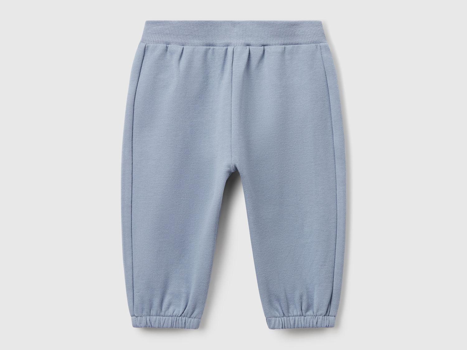 Pantaloni in felpa di cotone da neonato celeste | Benetton Outlet