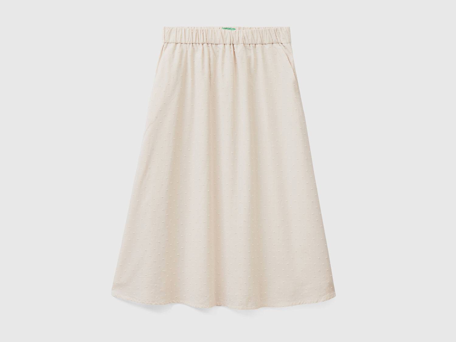 Gonna midi foderata realizzata in tessuto di puro cotone da donna beige | Benetton Outlet