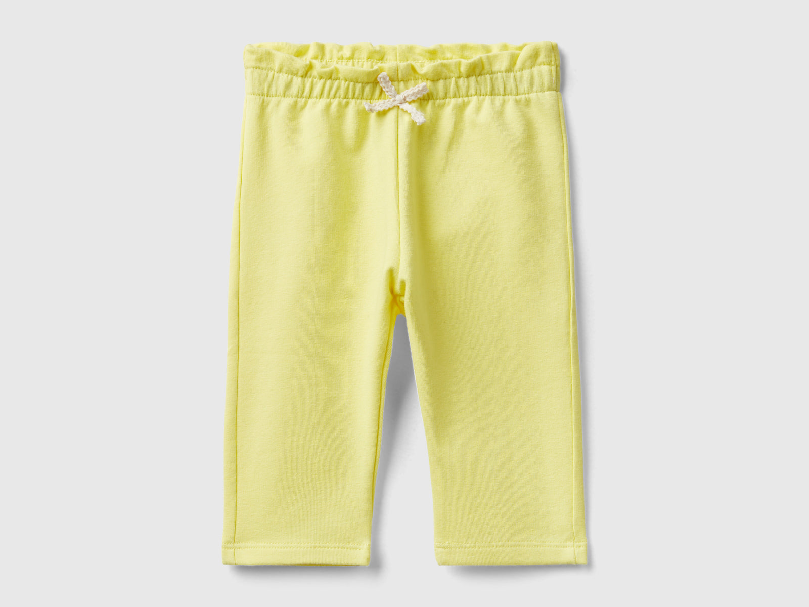 Pantaloni in felpa di cotone bio stretch da neonato giallo | Benetton Outlet