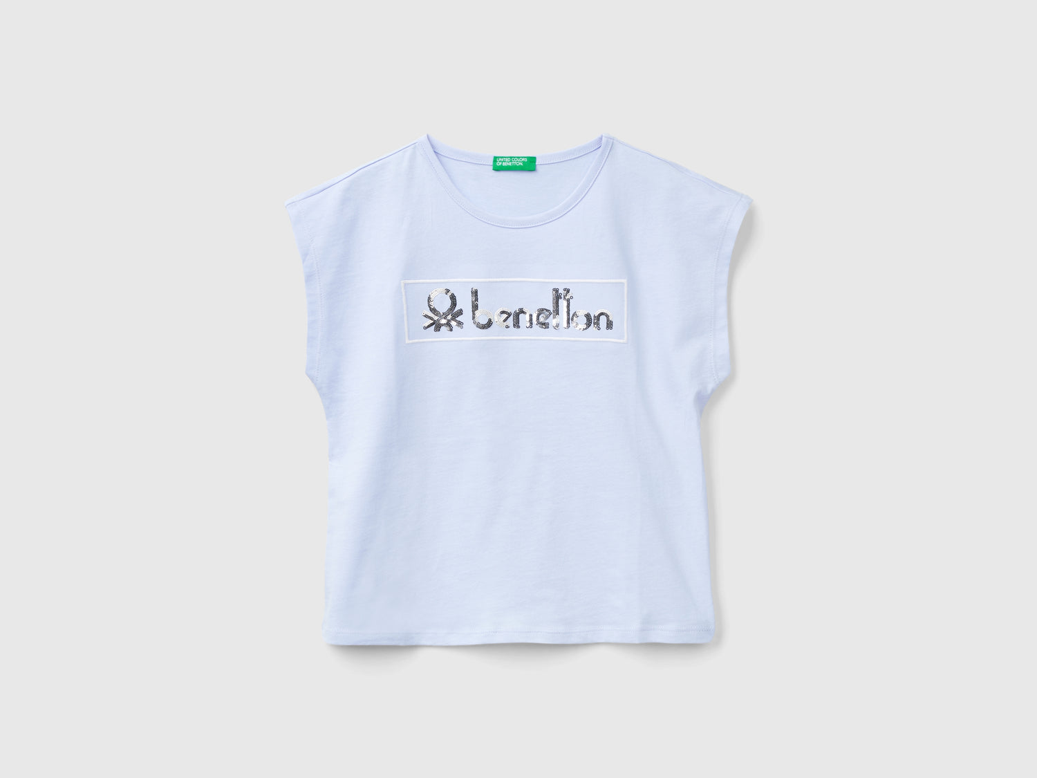 T-shirt con paillettes da bambina celeste | Benetton Outlet