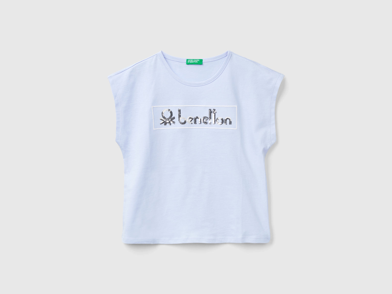 T-shirt con paillettes da bambina celeste | Benetton Outlet