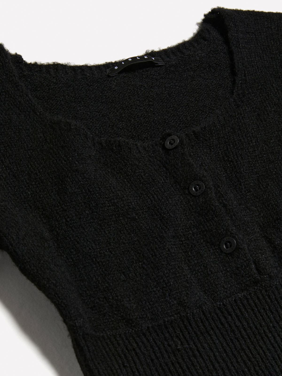 Maglia cropped con bottoncini