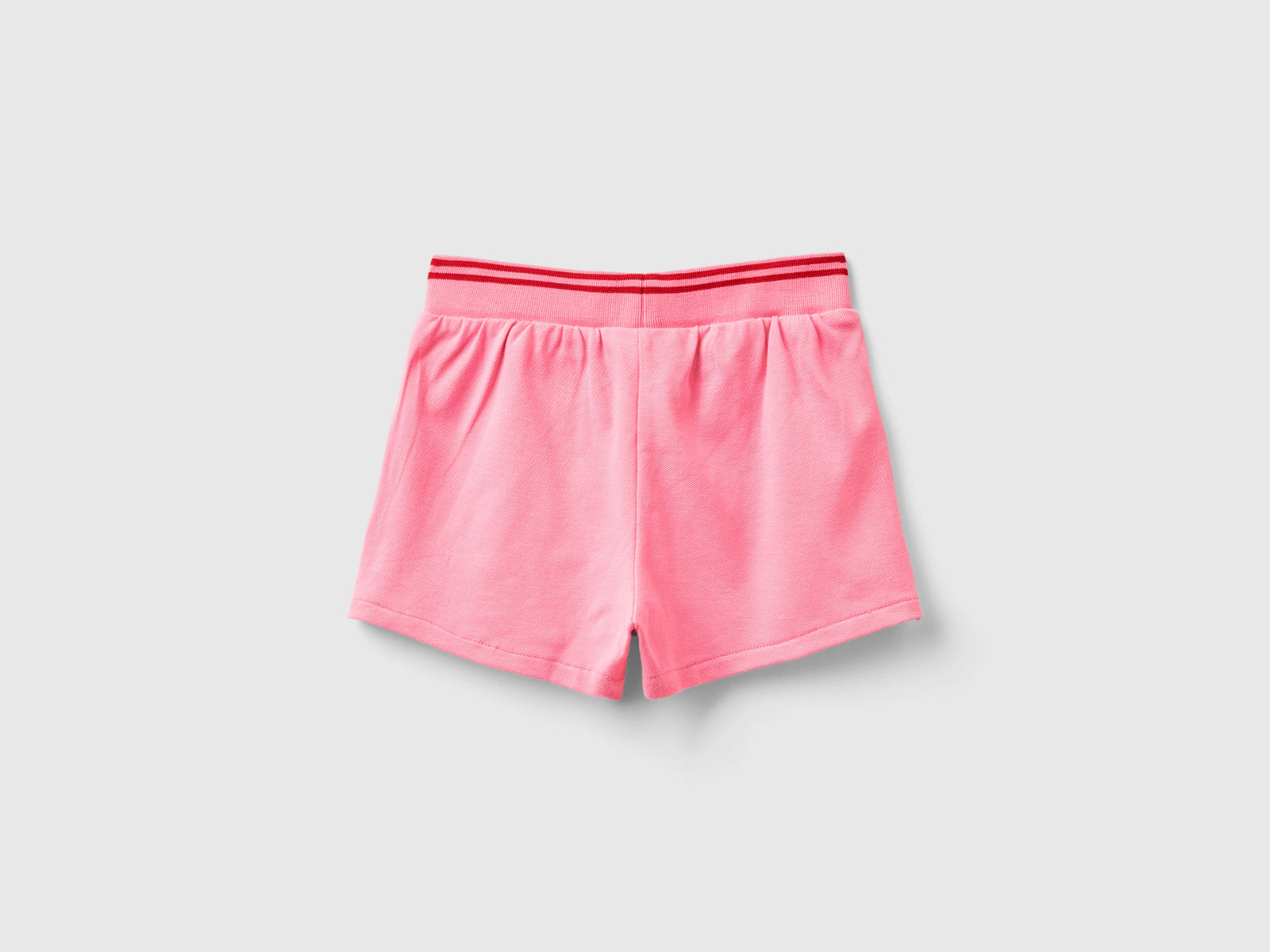Gonna pantalone in cotone bio stretch da bimba rosa 2 | Benetton Outlet