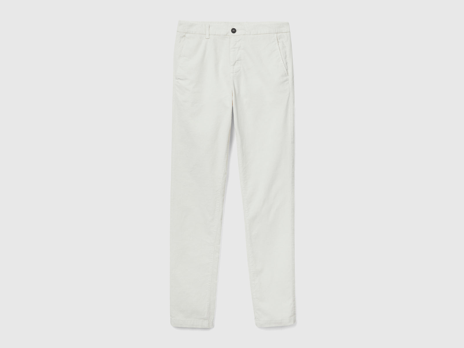 Pantaloni in velluto stretch da uomo bianco | Benetton Outlet