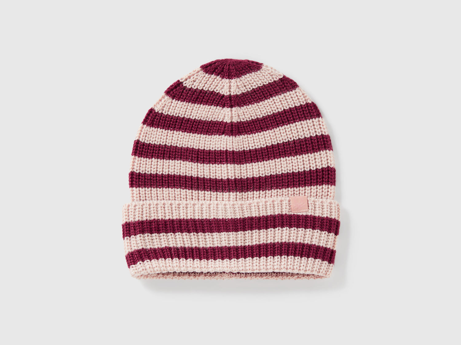 Cappellino in maglia a righe da bambino rosa tenue | Benetton Outlet