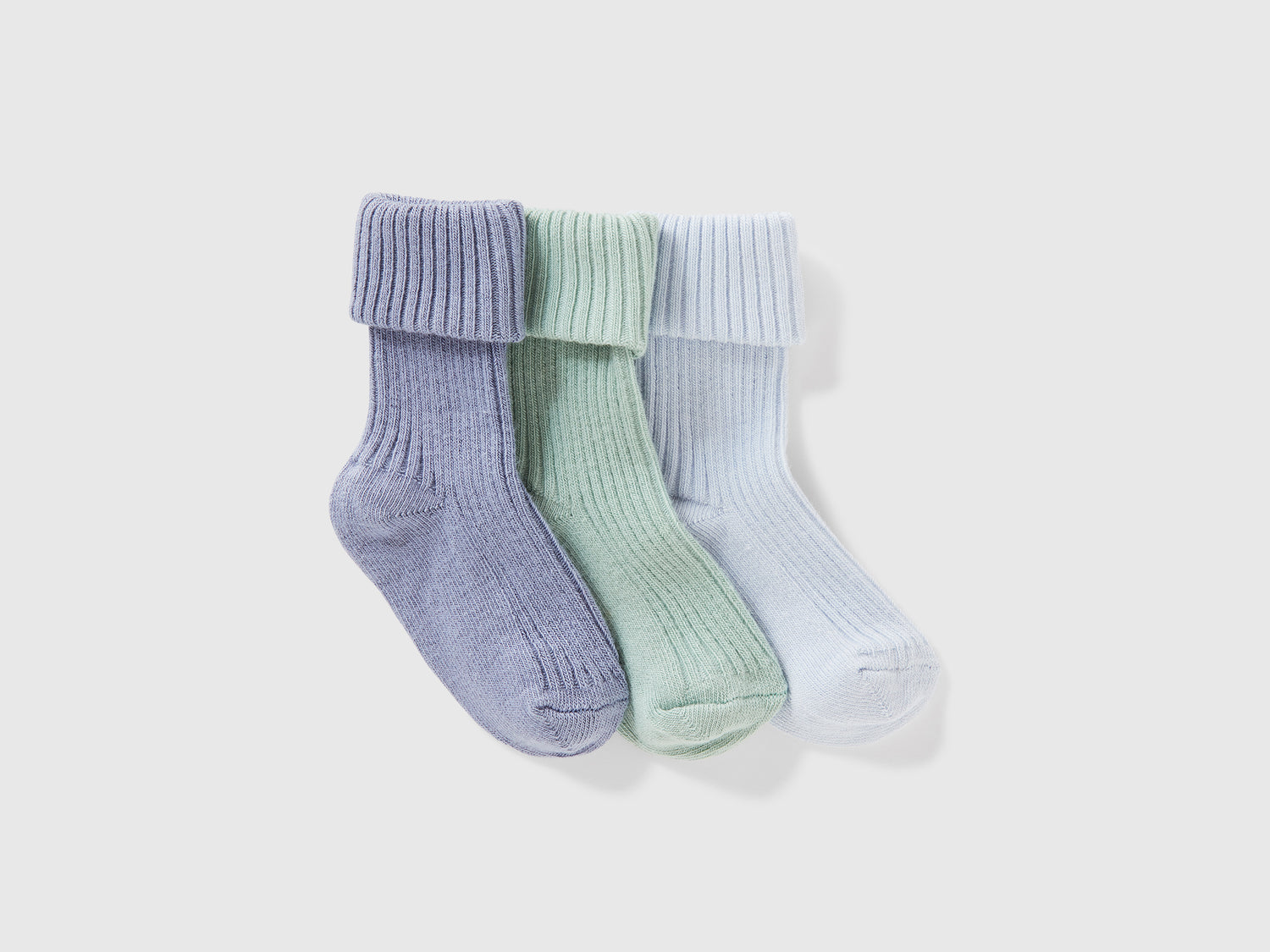 Tre paia di calzini a costine da neonato multi-color | Benetton Outlet