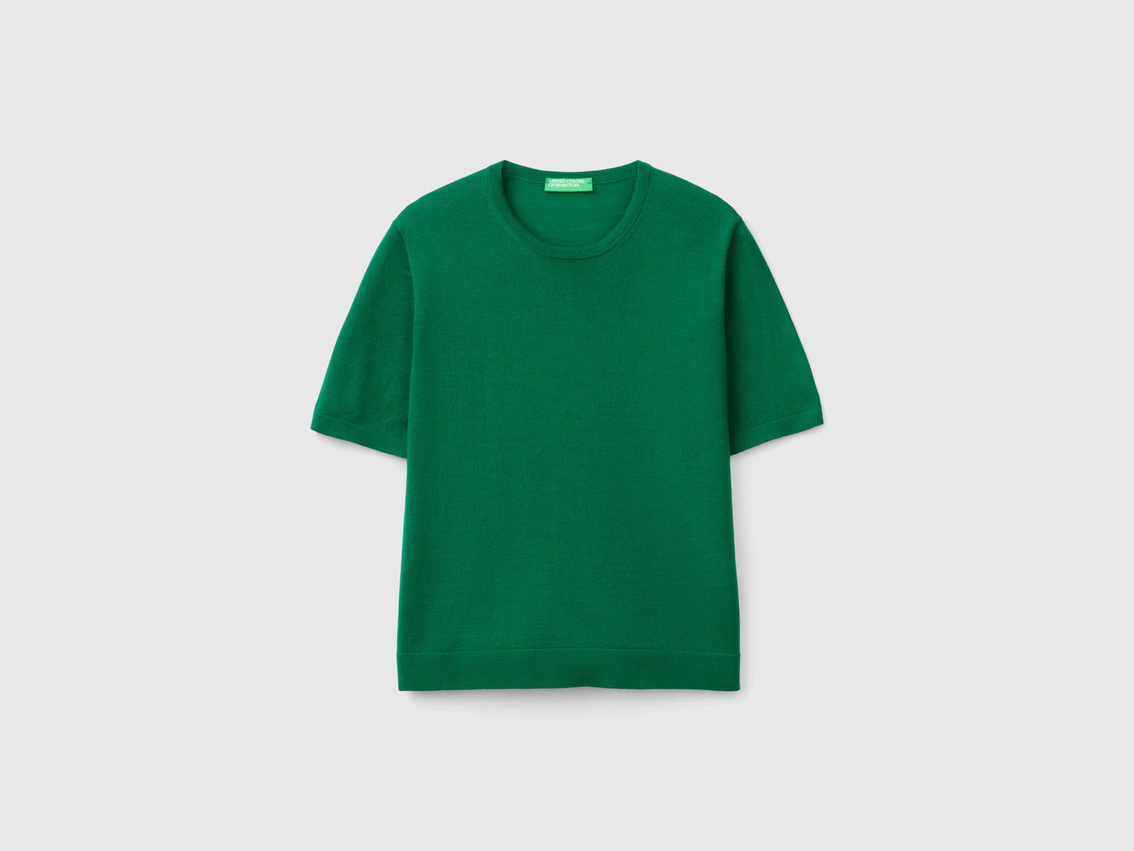 Maglia manica corta in pura lana Merino da donna verde | Benetton Outlet