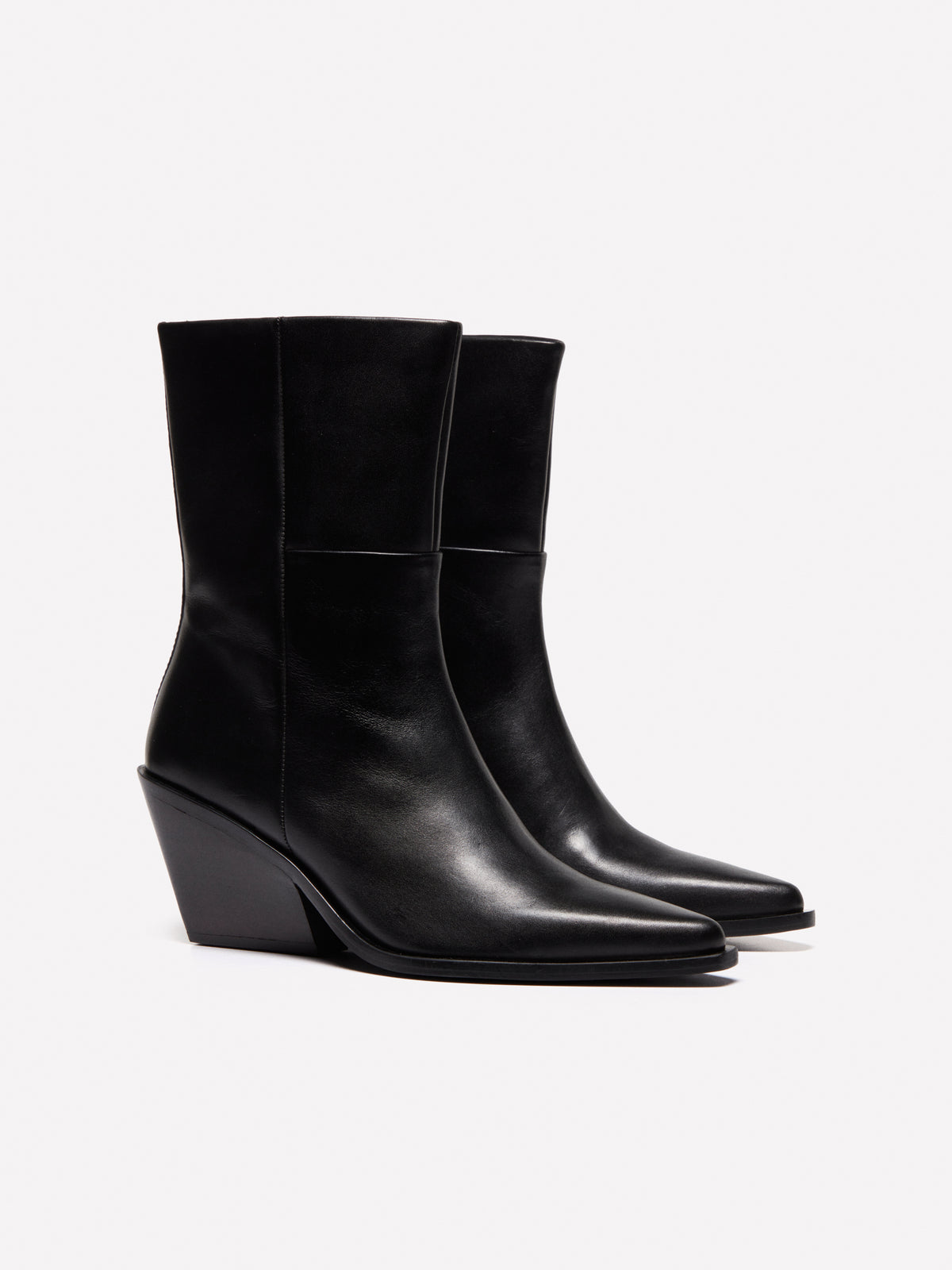 Botines de piel tejana