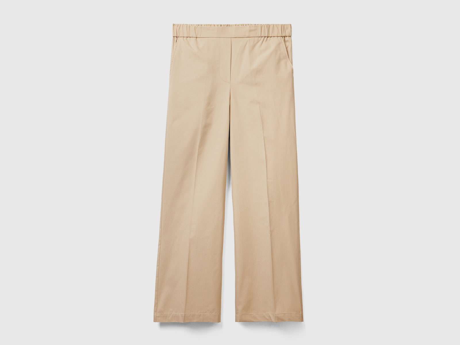 Pantaloni lunghi in puro cotone con gamba morbida da donna beige | Benetton Outlet
