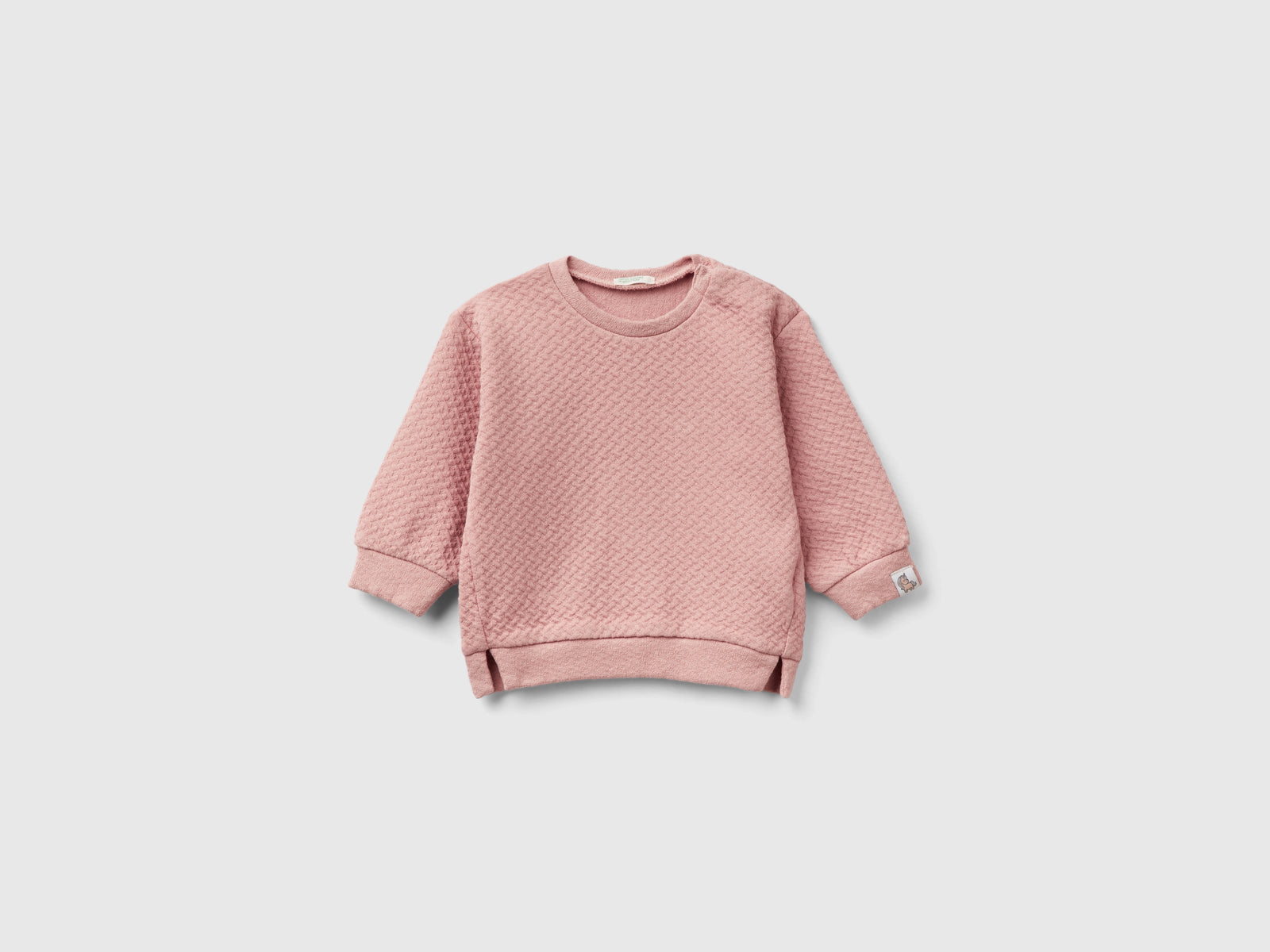 Felpa chiusa jacquard da neonato rosa tenue | Benetton Outlet