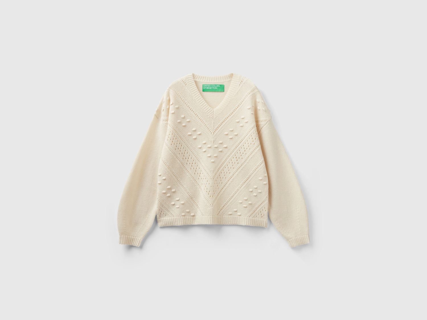 Maglia lavorata boxy fit da donna bianco panna | Benetton Outlet