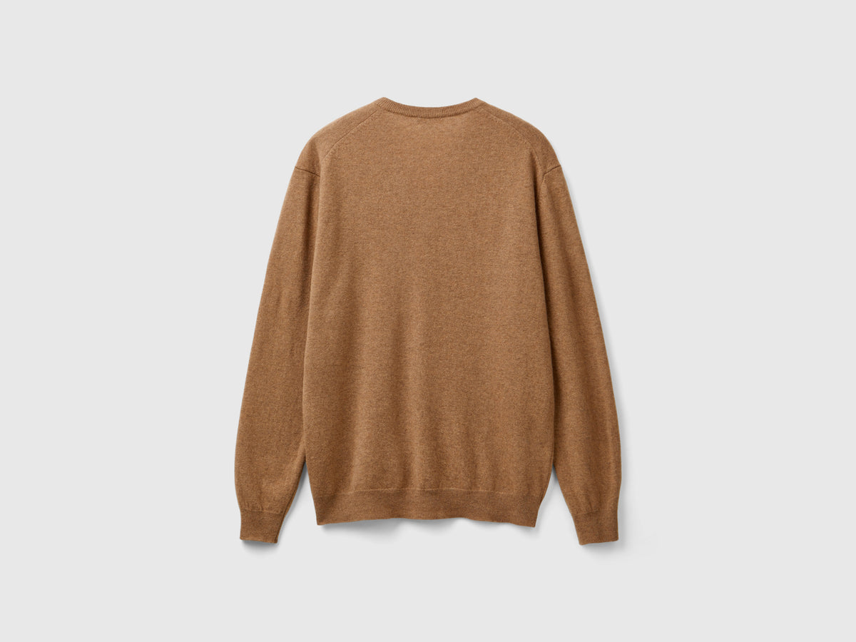 Maglia scollo a V mélange in pura lana Merino