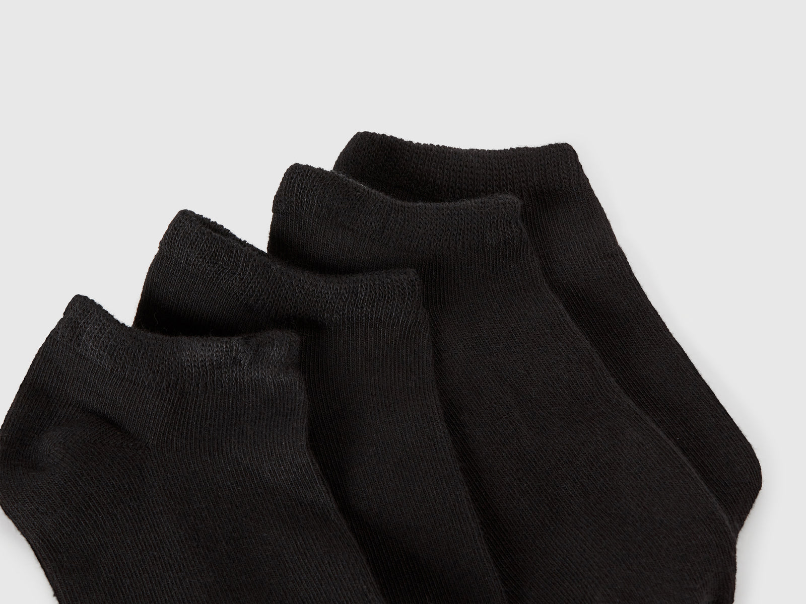 Quattro paia di calzini corti da bambino nero 2 | Benetton Outlet