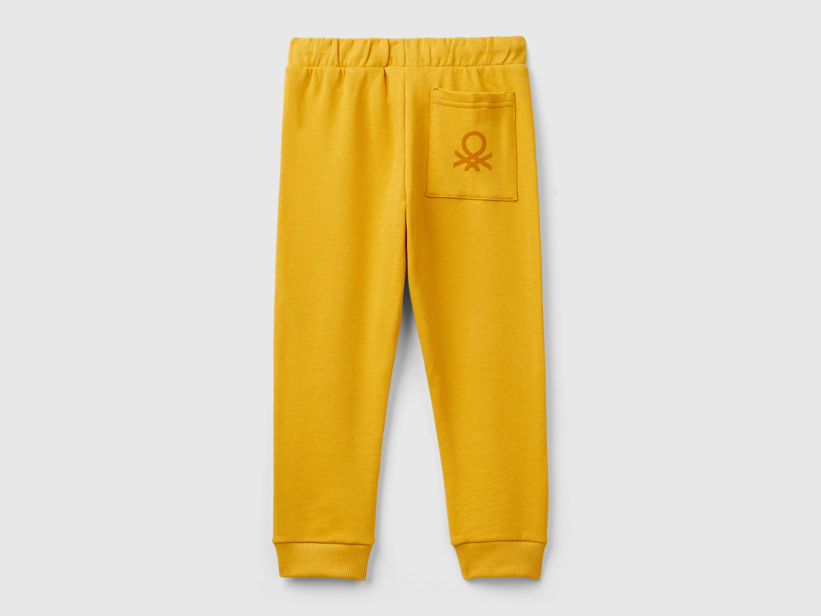 Pantaloni in felpa con taschino da bimbo senape 2 | Benetton Outlet