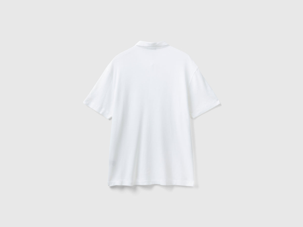 Polo con taschino relaxed fit