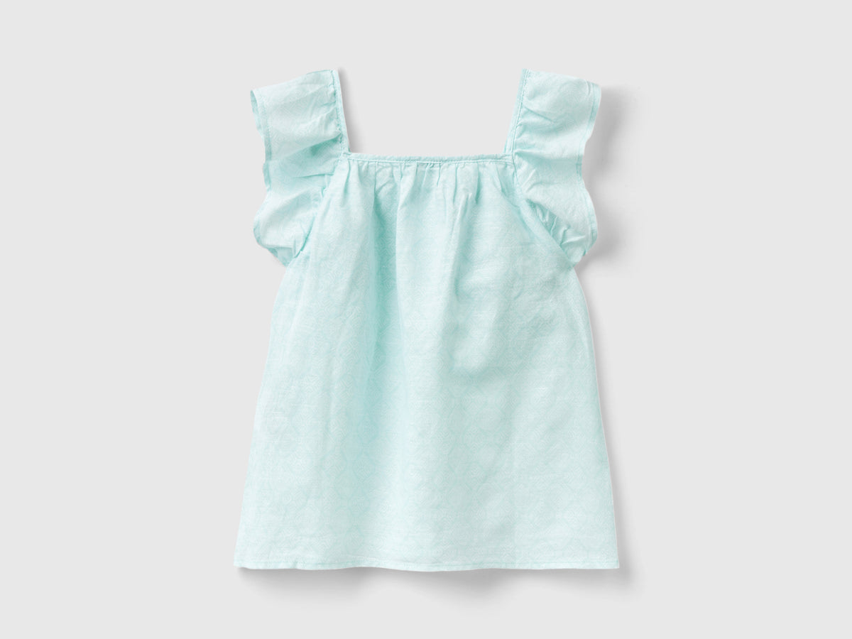 Blusa fantasia in misto lino