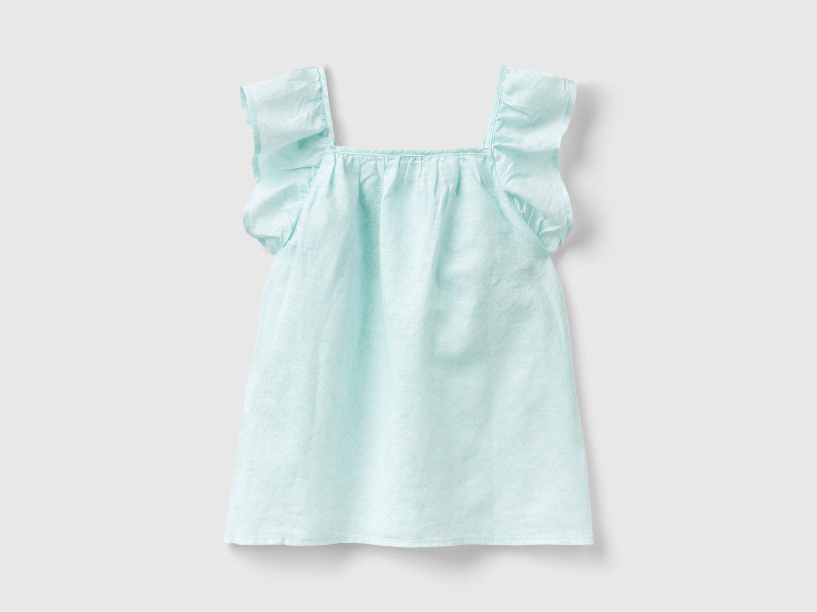 Blusa fantasia in misto lino da bambina rosa pastello 2 | Benetton Outlet
