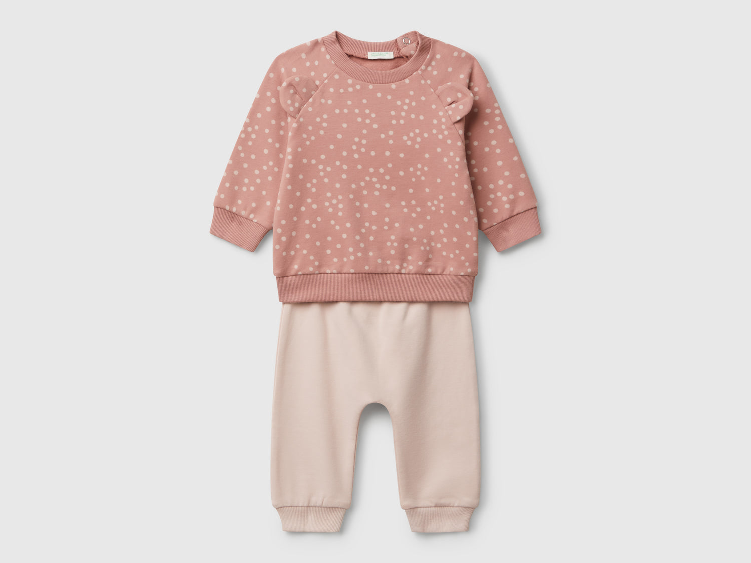 Completino in felpa con stampa da neonato rosa | Benetton Outlet