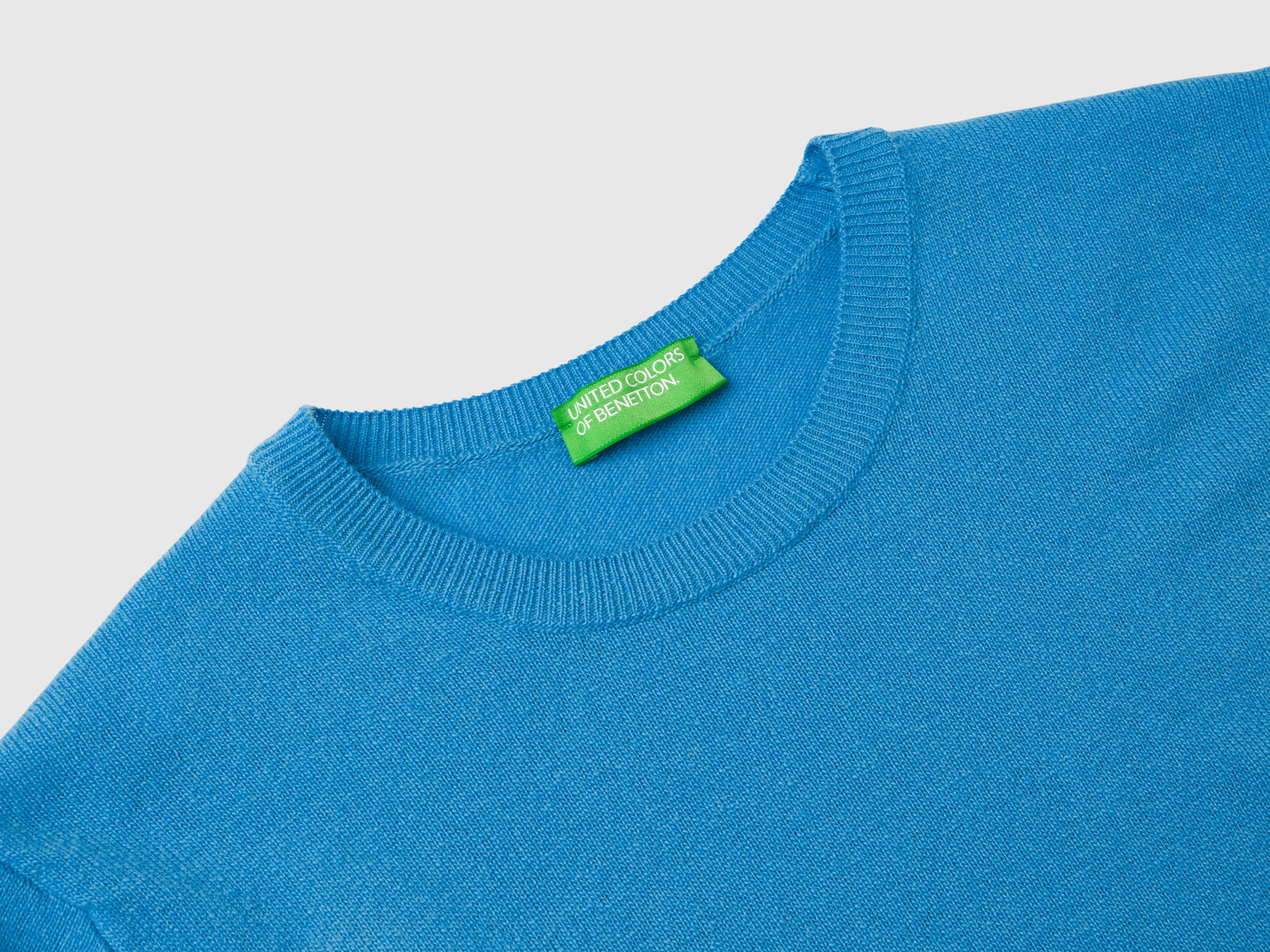 Maglia girocollo in pura lana Merino da donna azzurro 3 | Benetton Outlet