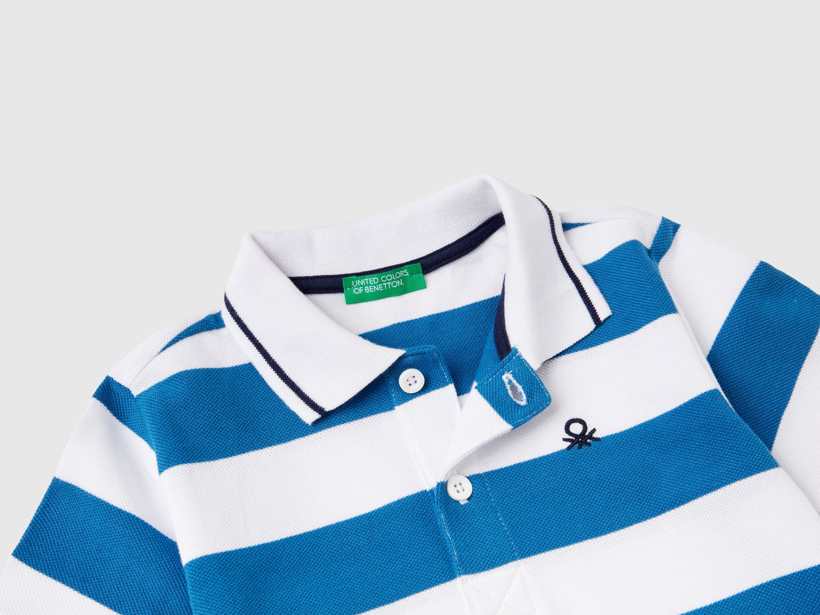 Polo manica corta a righe da bimbo blu | Benetton Outlet