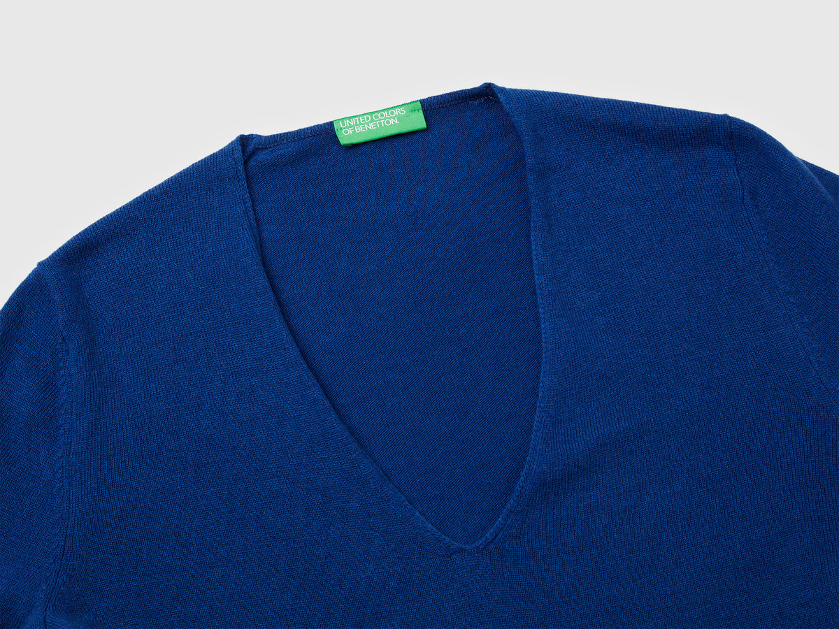 Maglione con scollo a V in pura lana Merino