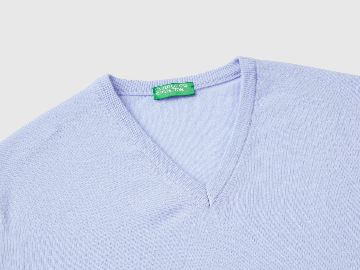 Maglia scollo a V carta da zucchero in pura lana Merino