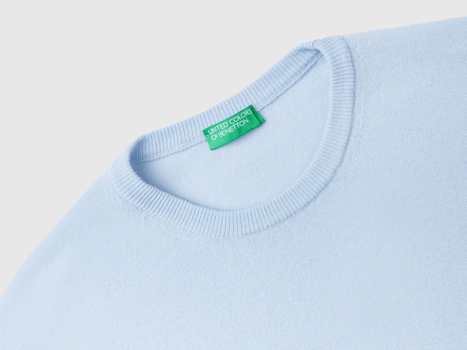 Maglia girocollo in pura lana Merino da uomo celeste 3 | Benetton Outlet
