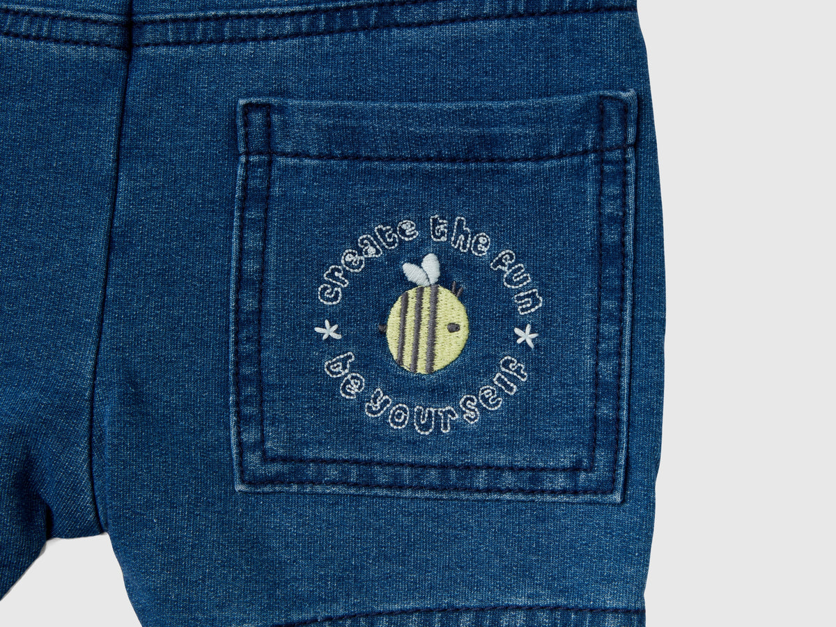 Salopette corta effetto denim