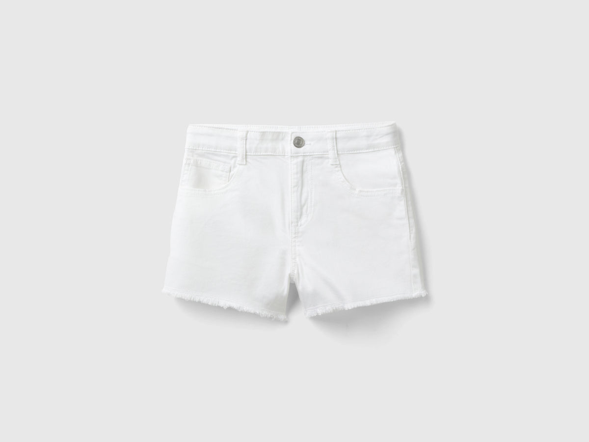 Shorts sfrangiati in cotone stretch