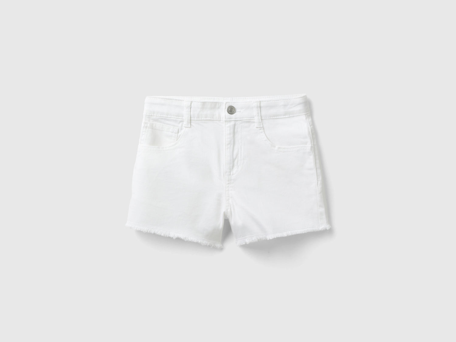 Shorts sfrangiati in cotone stretch da bambina bianco | Benetton Outlet