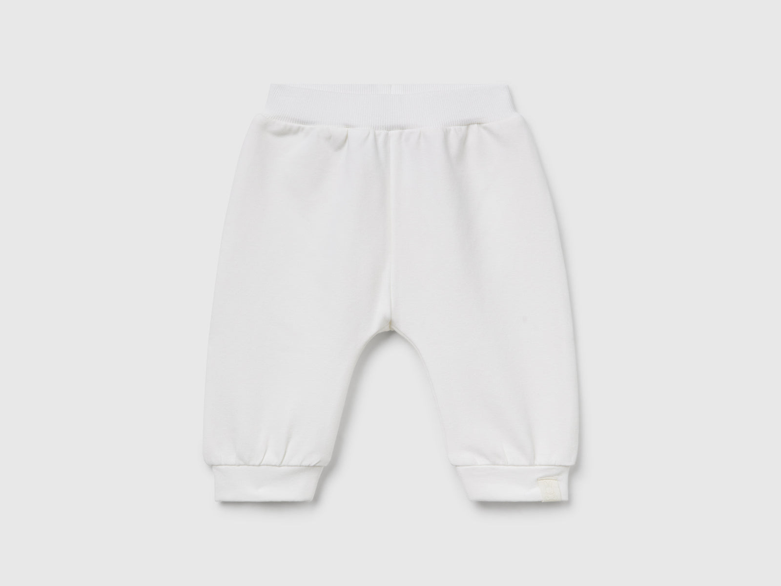 Pantaloni in felpa da neonato bianco panna | Benetton Outlet