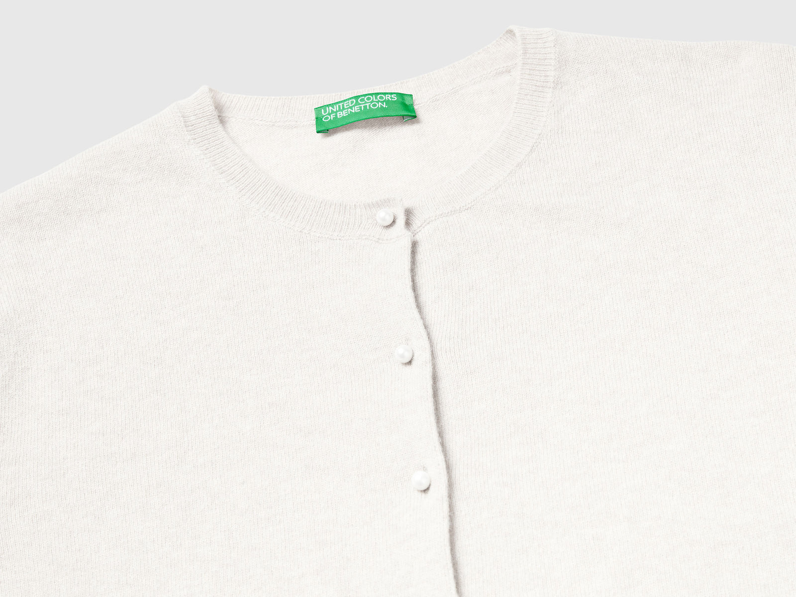Cardigan panna in pura lana Merino da donna bianco panna 5 | Benetton Outlet
