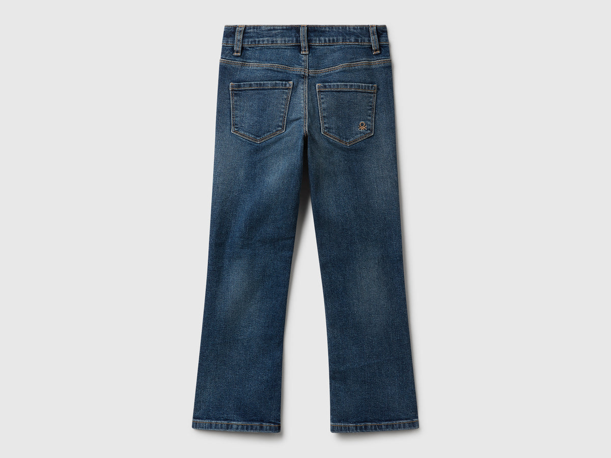 Jeans cinque tasche a zampa